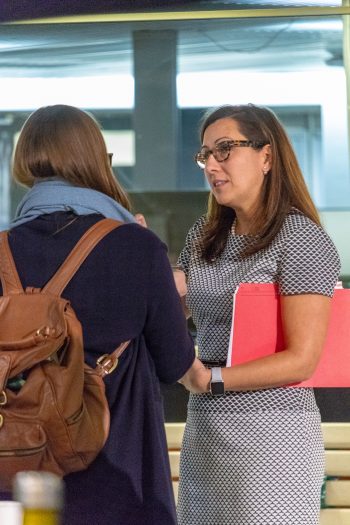 Deputy Mayor Ana Bailão,talking to event attendee