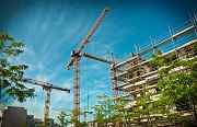 Cranes surround a new building being built