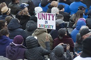 A person holding a sign reading Unity in Diversity at the Toronto Strong vigil