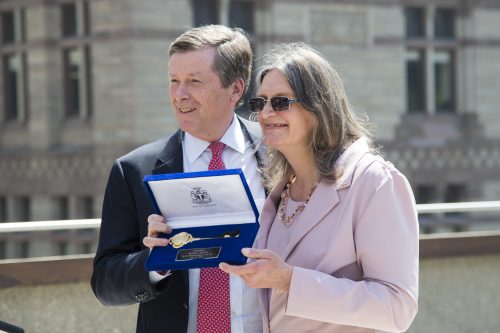 Susan Gapka is presented with the key to the City by Mayor Tory