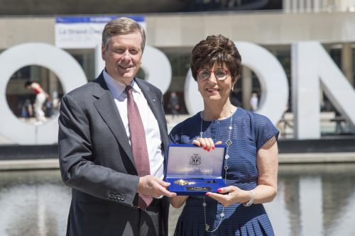 Fran Sonshine is presented with the Key to the City by Mayor Tory