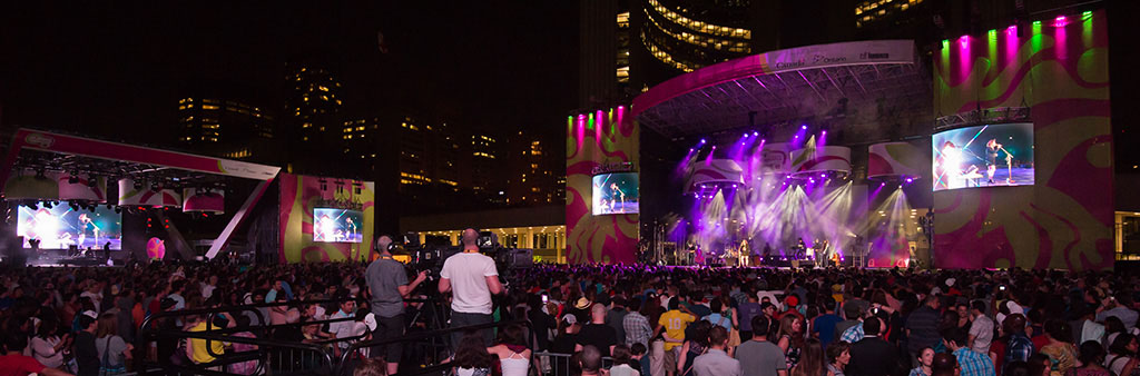 Serena Ryder on stage with large crowd at Panamania