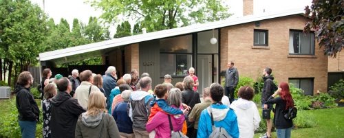 people on walking tour - in front of modern building Image info: Modern TO Bus Tour. Credit: Herman Custodio.