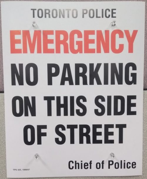 Example of Construction signage Toronto Police which states no parking on this side of the street