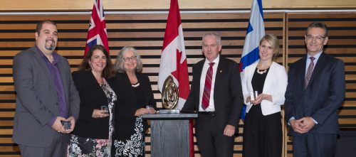 Customer experience category winners for Toronto's APS – Simple, Fair and Fast Dispute Resolutions. From left to right: Lenny Di Marco, Kalli Chapman, Susan Garossino, Chris Murray, Susan Pape, Casey Brendan