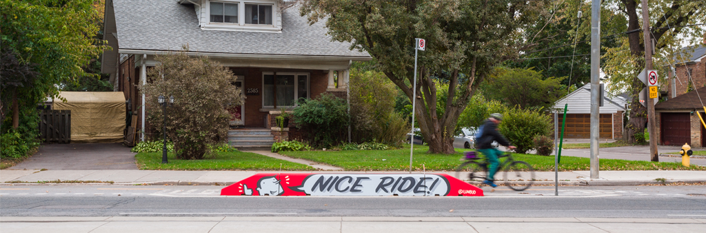 painted concrete barrier at Lake Shore Blvd Cycle Track