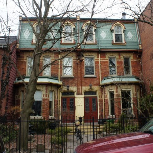 This is a photograph of two semi-detached houses designed in the Second Empire style on Seaton Street