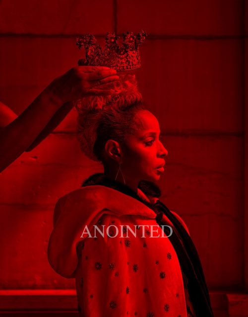 Image info: Carrie Mae Weems Anointed, 2017. Image credit: Courtesy the artist and Jack Shainman Gallery, New York. Woman in cape with crown being placed upon head - photo awash with red.