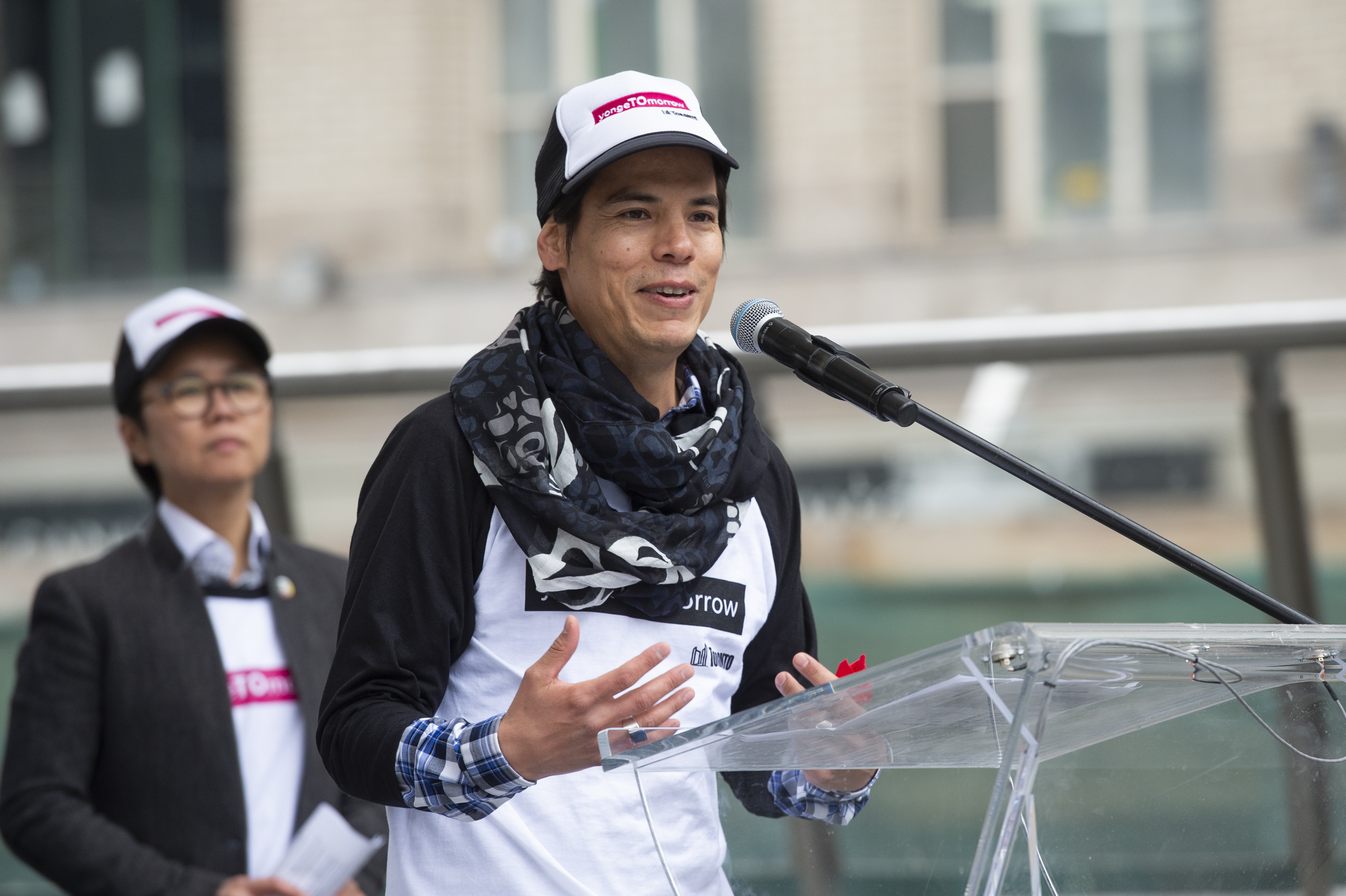 Speaker addressing land acknowledgement for Toronto