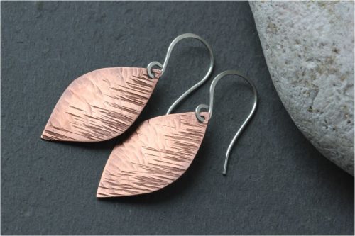 Image info: Flora Lea. copper coloured, leaf shaped earrings