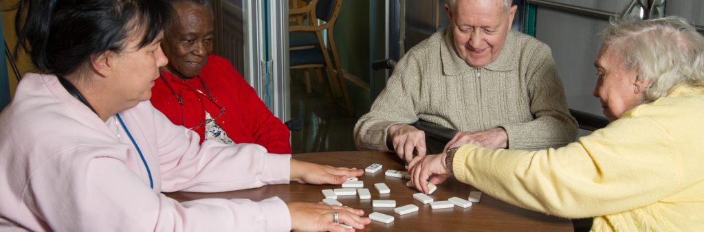 Seniors playing dominoes
