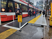 A raised transit platform on King Street at a streetcar stop