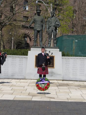 This is an image of the Annual Police Memorial Ceremony at Queen's Park