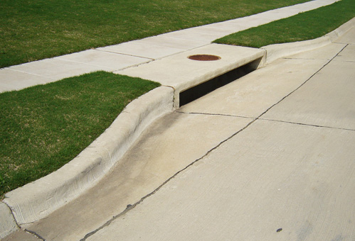 Example of infrastructure on the road that helps divert surface drainage