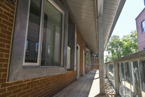 25 Leonard Ave. exterior entrance. Covered porch and windows.