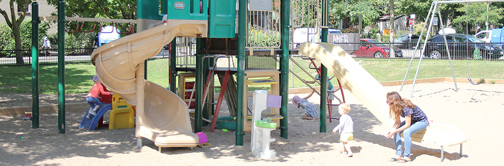 People playing on the playground equipment at Charles G. Williams Park