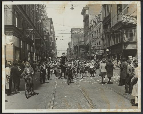 People celebrating in street