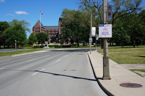 Image of University Avenue before the bike lane installation with four lanes of traffic. 