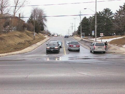 Image of Wilmington Avenue/Faywood Boulevard before the bike lane installation with two lanes of traffic. 
