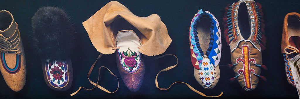 A poster with various Indigenous moccasins