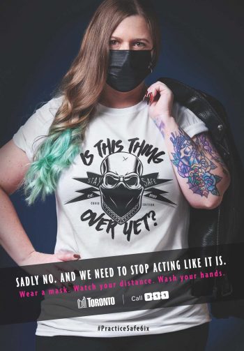 Young woman wearing a t-shirt with text saying is this thing over yet?