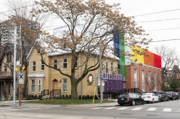 outdoor side view of building with colourful siding