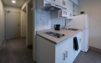 Kitchen and closet space in 11 Macey Ave unit