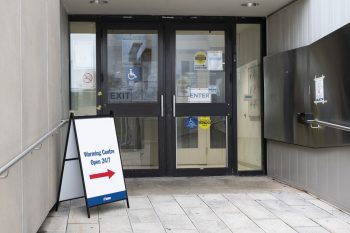 sign that points to the warming centre entrance