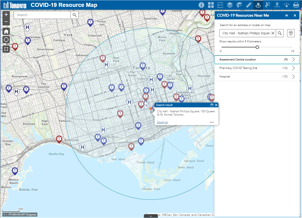 Display of Map zoomed to City Hall with a buffer circle around it for 5 km in all directions - as well show the COVID-19 Resources Near Me menu with the number of Assessment Centre locations that fall within the buffer showing (9) - same for COVID testing sites(14) and Hospital.(15)