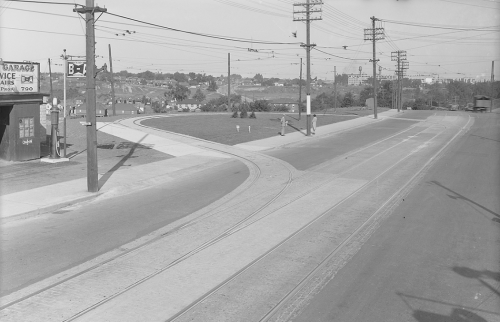 Vacant large circular bus loop beside a BA Oil Gas Station.