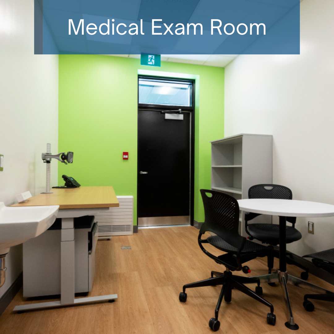 desk with chair and a cupboard located within the medical room