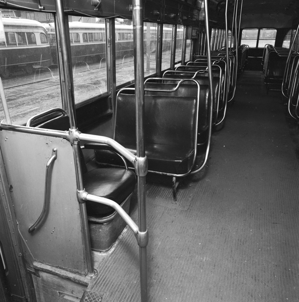 Interior of empty streetcar.