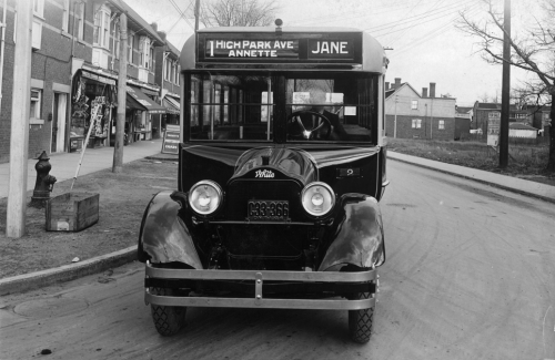 Front of a bus with a front that looks like an old-fashioned truck. The sign reads "High Park Ave., Annette, Jane.: