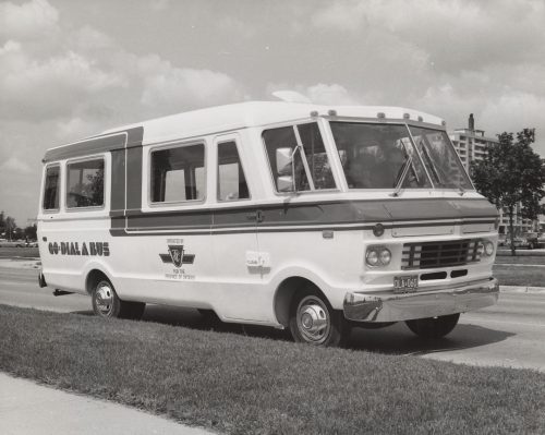 A large van with "Go dial a bus" and the TTC logo on the side.