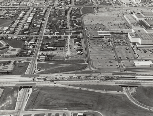 Yorkdale mall parking lot and part of mall with subdivisions surrounding the parking lot.