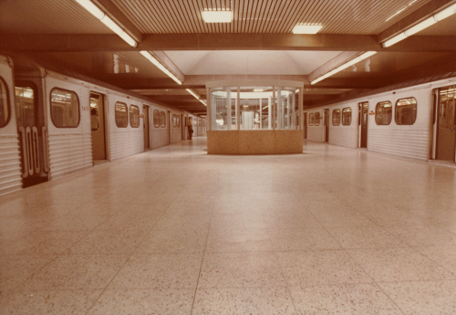 Subway platform with subway trains on either side