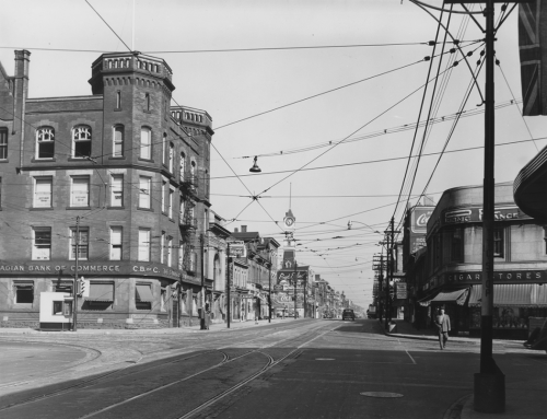 A four-storey brick building with turrets at the corners like a castle.