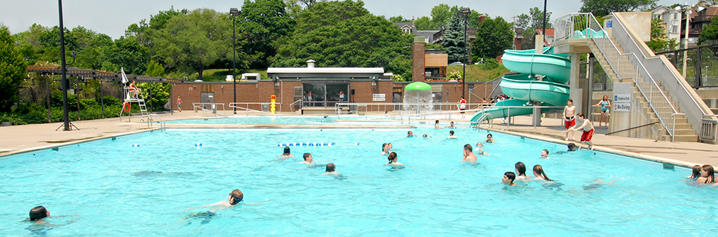 People swimming at Riverdale Park East outdoor pool during leisure swim