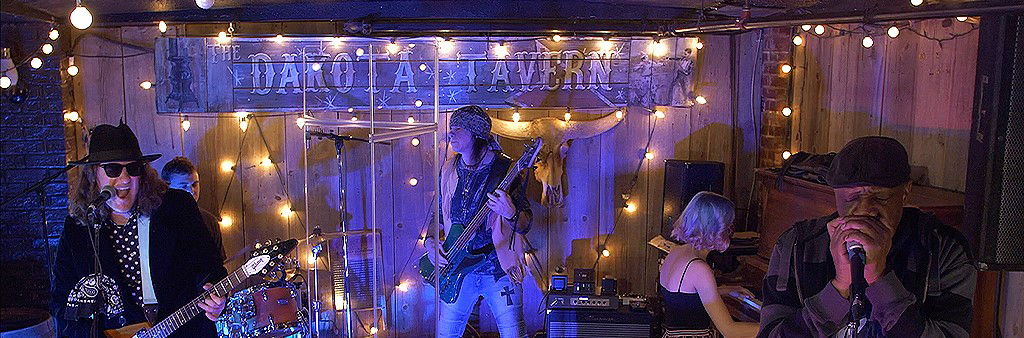 Image depicts band playing at the Dakota tavern