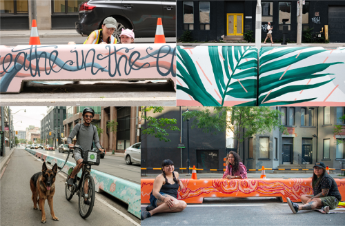 painted concrete cycle track barriers lined up along Richmond St.