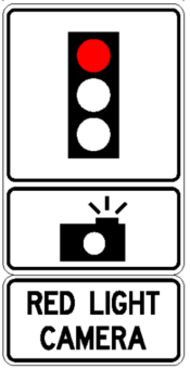 Image of a red light camera street sign