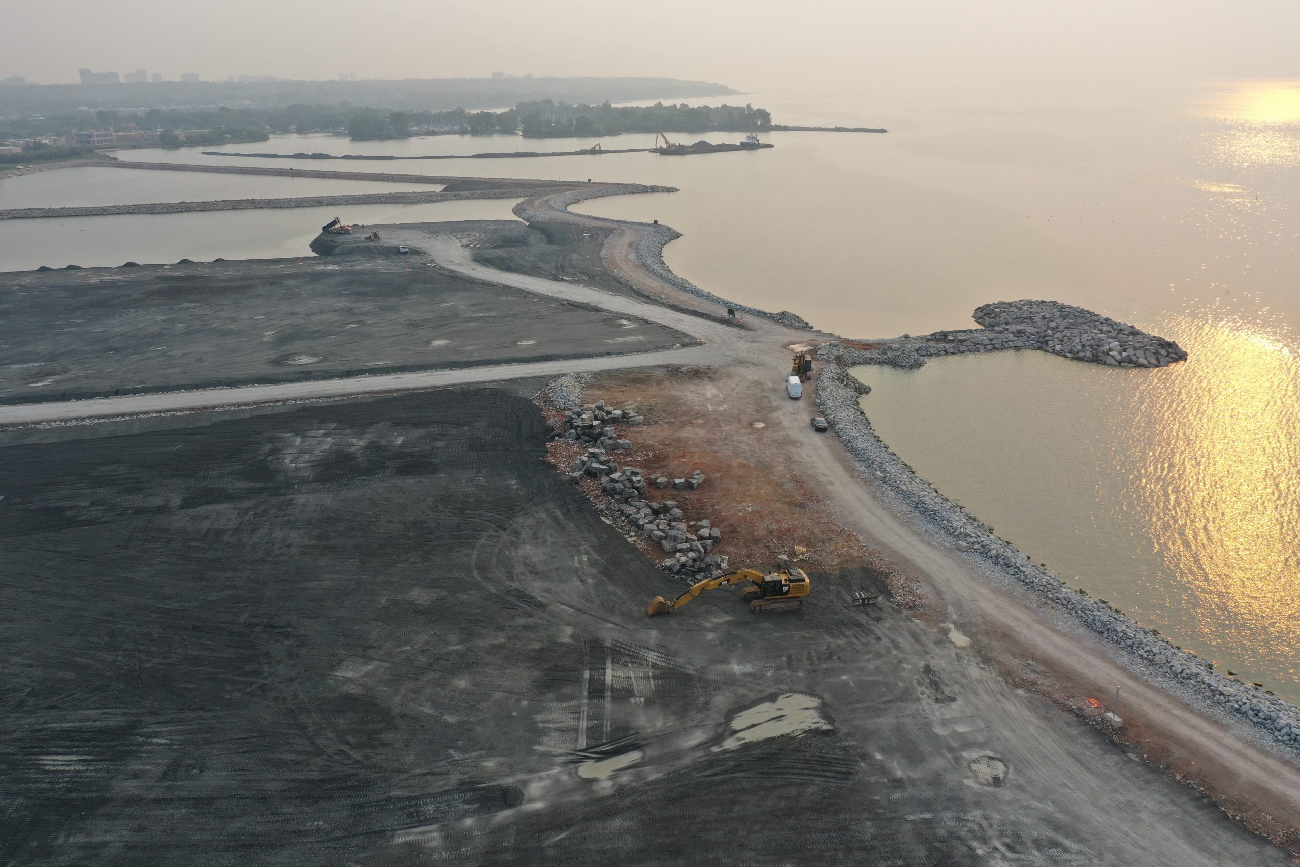 Photo of Ashbridges Bay Landform project construction at sunrise July 2021