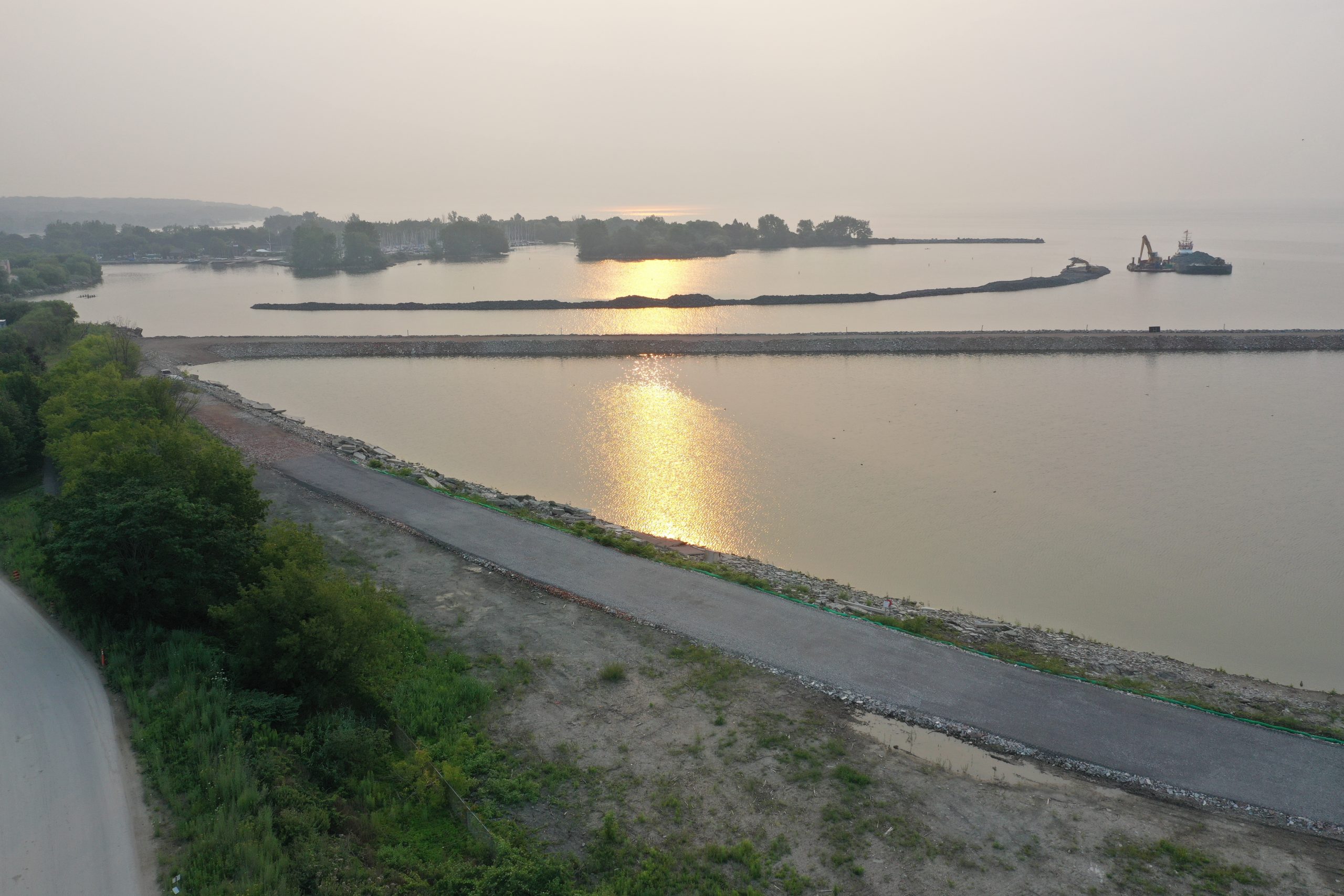 Photo of Ashbridges Bay Landform project construction at sunrise July 2021