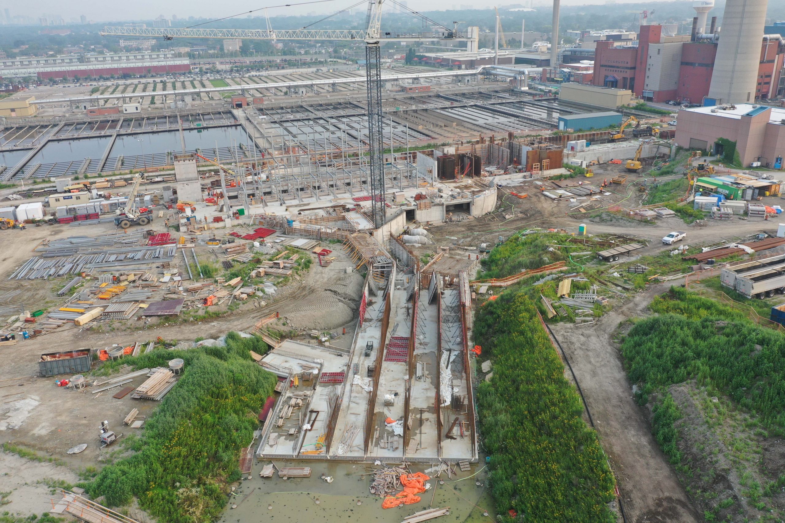 Ashbridges Bay Treatment Plant UV Disinfection project. UV Disinfection project new final effluent channels in foreground July 2021