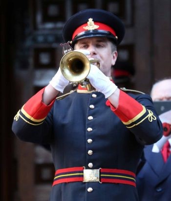 Image of a bugler playing the Last Post