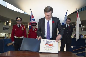 Image of Mayor Tory dedicating the Great War Book of Remembrance