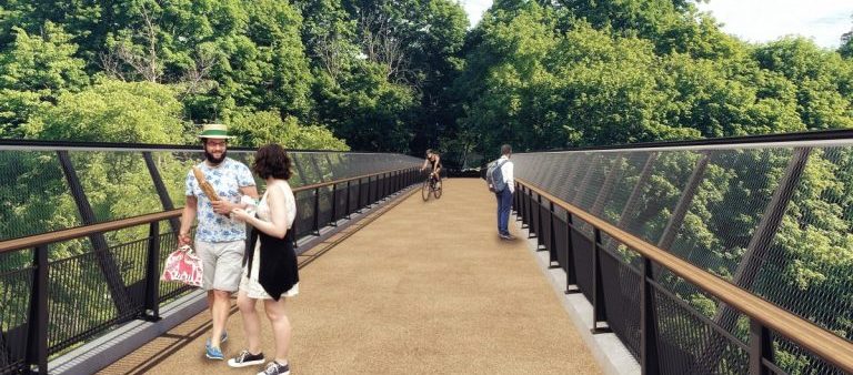 Artist rendering of the proposed bridge design, wide pedestrian bridge with high railing and fence.