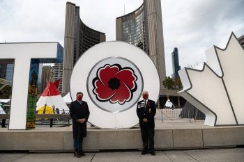 Image of the Toronto sign with a Toronto poppy insert