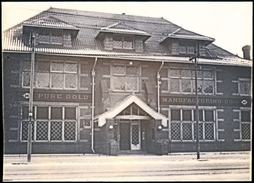 Postcard of Pure Gold Manufacturing Co. factory