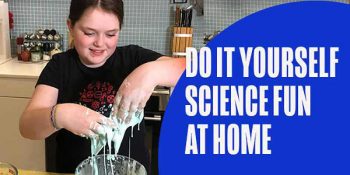 Teenager in a kitchen plays with blue slime. Text overlay says Do It Yourself Science Fun at Home